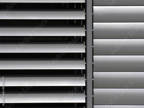  metallic window shutter at the office building