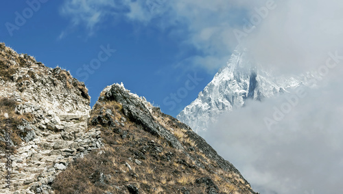 The trek near Dingboche with Ama Dablam (6814 m) in the background - Everest region, Nepal photo