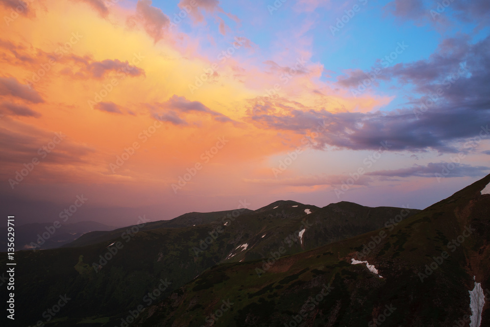 Beautiful view of the sky at sunset in Carpathians in the summer