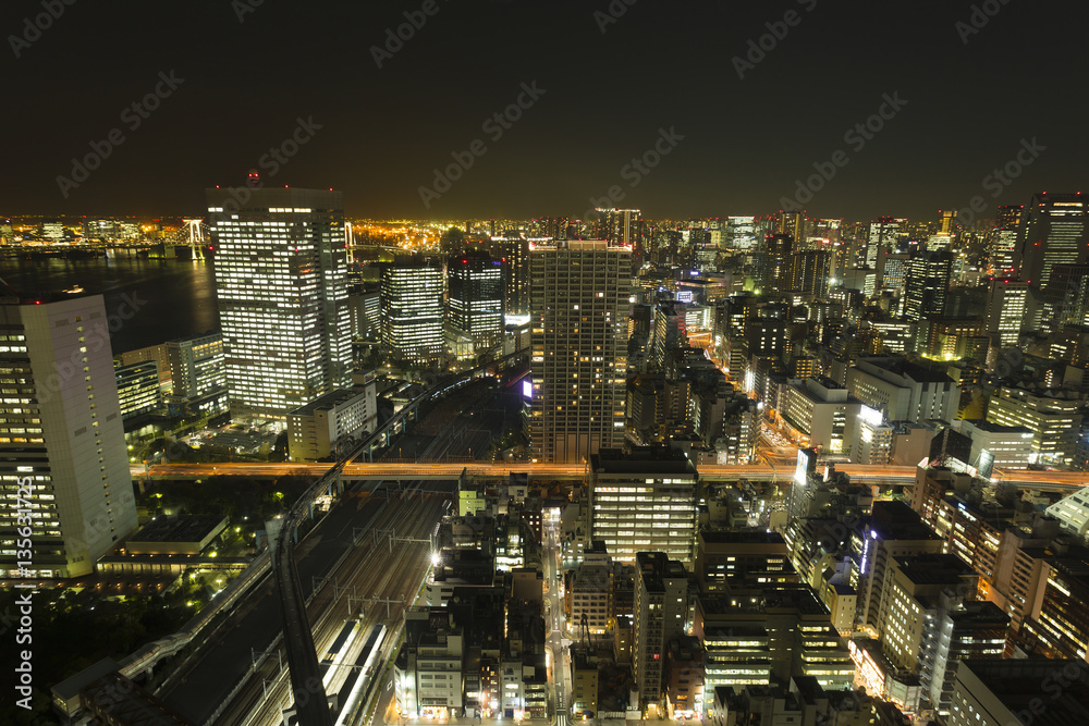 東京都市風景　夜景　大都会の喧噪　様々な交通が交差　芝浦　田町　モノレール　新幹線　俯瞰