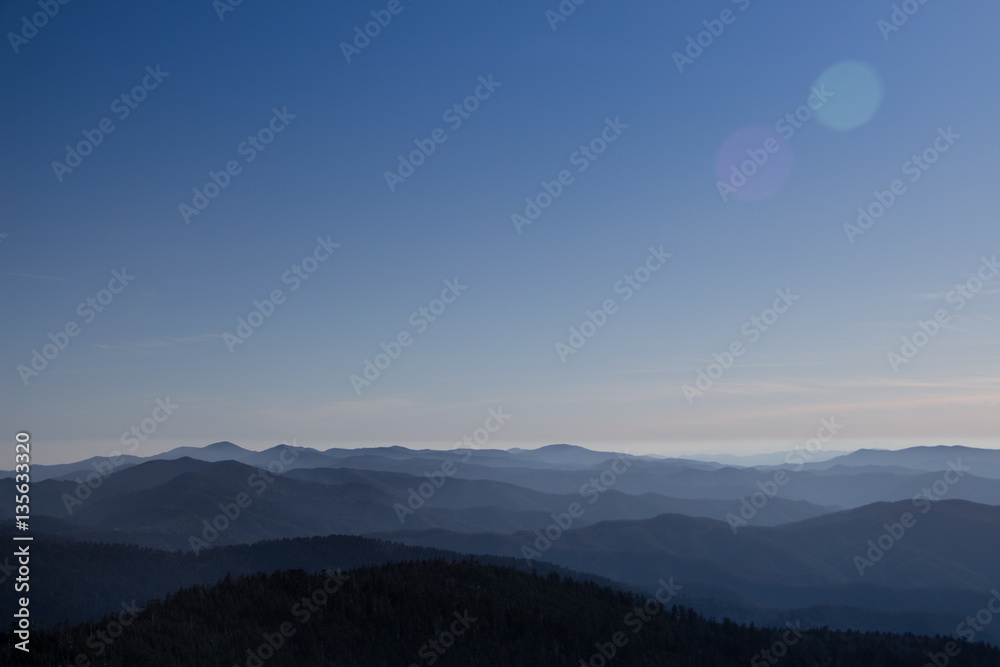 Fototapeta premium Foggy Sunrise in the Mountains