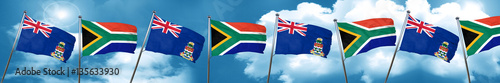 cayman islands flag with South Africa flag, 3D rendering