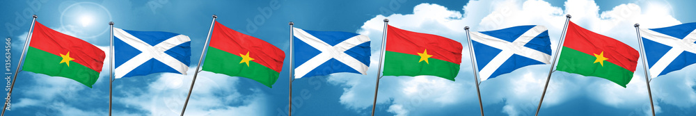 Burkina Faso flag with Scotland flag, 3D rendering Burkina Faso flag with Scotland flag, 3D rendering