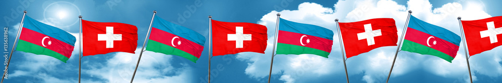 Azerbaijan flag with Switzerland flag, 3D rendering Azerbaijan flag with Switzerland flag, 3D rendering