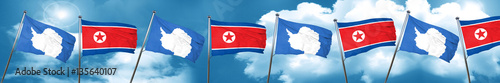 antarctica flag with North Korea flag, 3D rendering