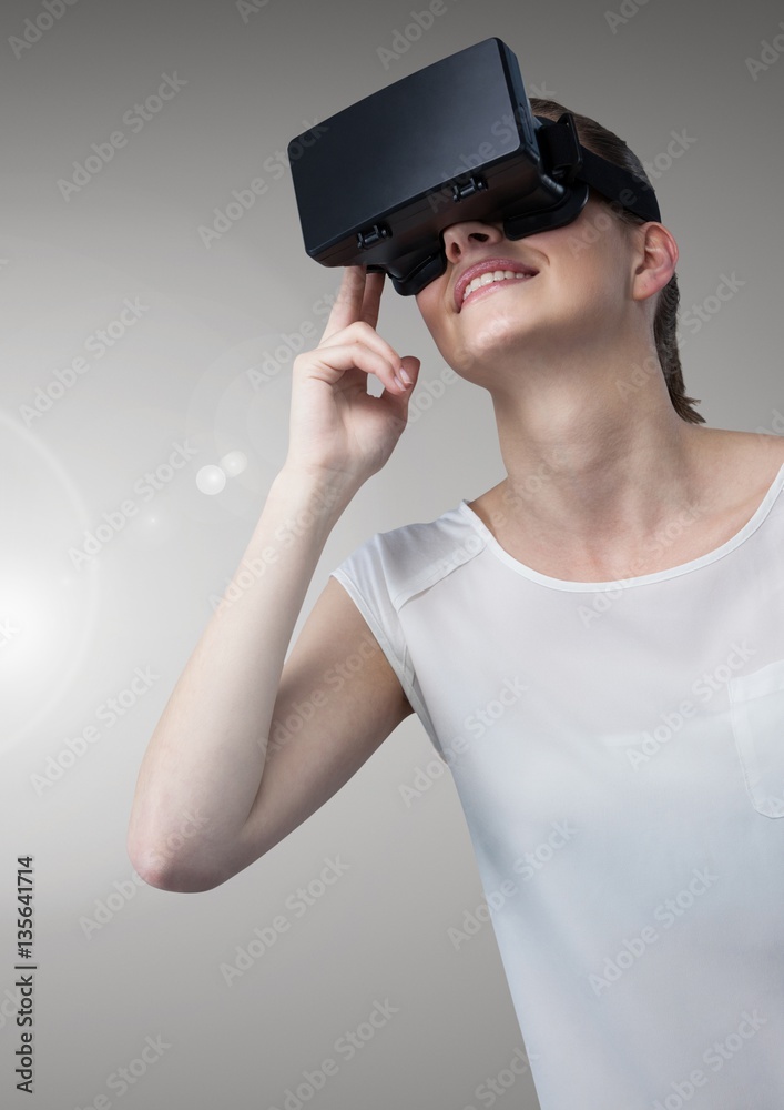 Attractive woman using virtual reality headset Attractive woman using virtual reality headset