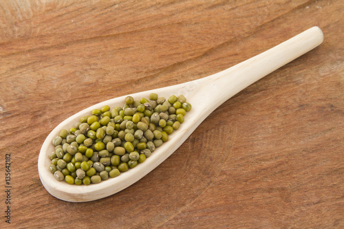 Mung bean on wood and isolated on white background 