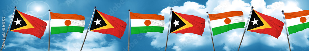 east timor flag with Niger flag, 3D rendering