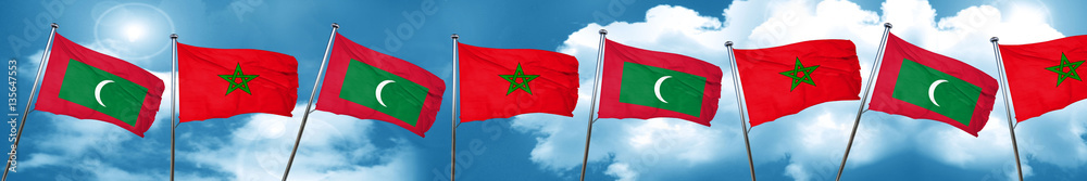 Naklejka premium Maldives flag with Morocco flag, 3D rendering