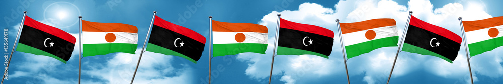 Libya flag with Niger flag, 3D rendering Libya flag with Niger flag, 3D rendering