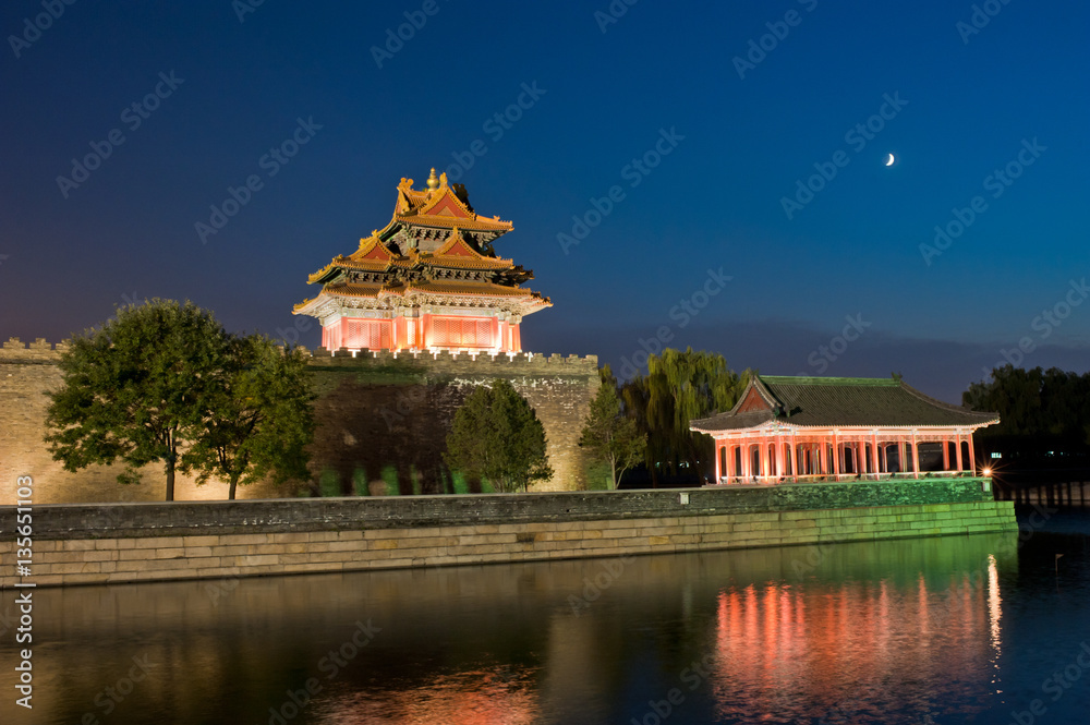 Watchtower and the moon in the night of Beijing