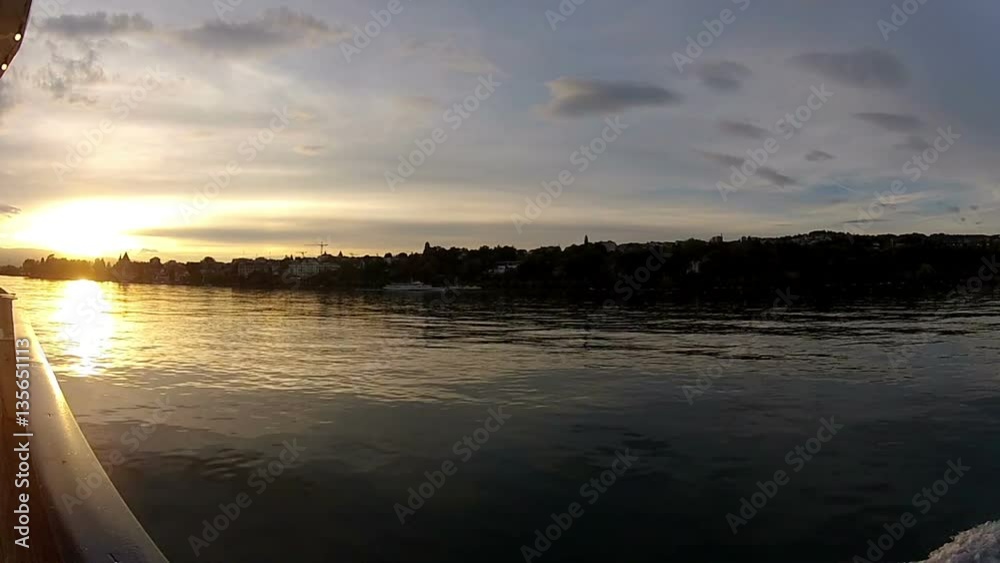 Ride on a ship on the lake geneva in switzerland in the evening hours with sunset Ride on a ship on the lake geneva in switzerland in the evening hours with sunset