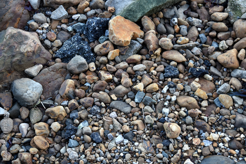 Pebbles by the beach looking down Pebbles by the beach looking down