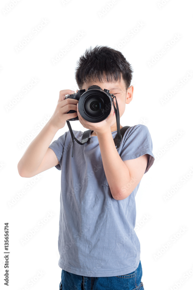 Little photographer taking photo over white background Little photographer taking photo over white background