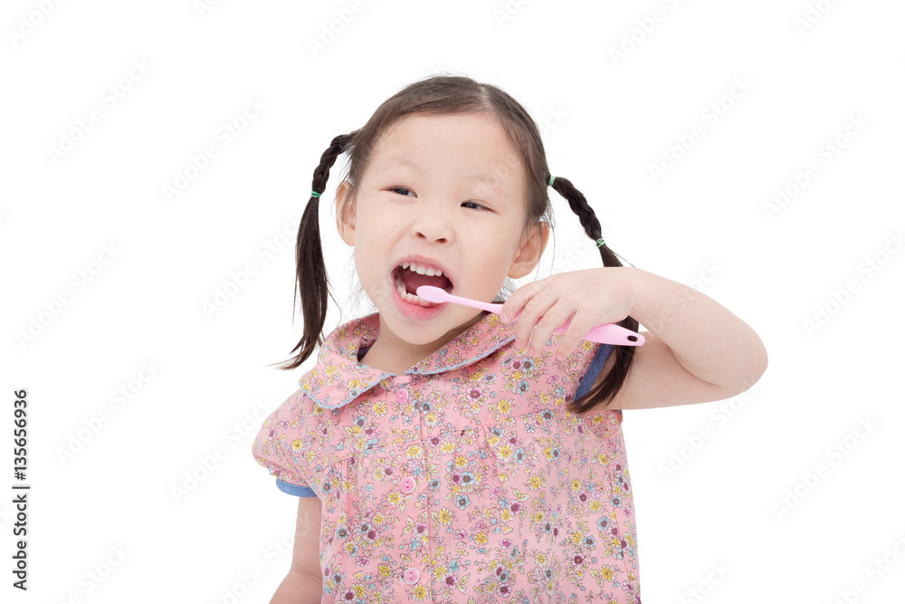 Little asian girl cleansing her teeth by toothbrush Little asian girl cleansing her teeth by toothbrush