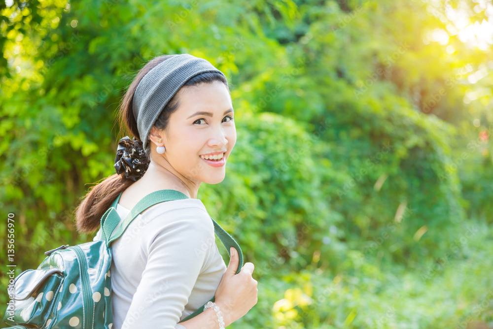 Beautiful asian woman with backpack outdoor Beautiful asian woman with backpack outdoor