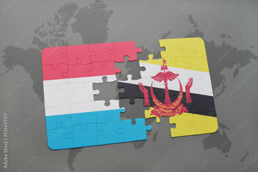 puzzle with the national flag of luxembourg and brunei on a world map
