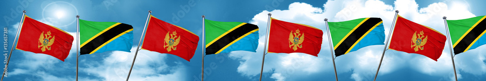 Naklejka premium Montenegro flag with Tanzania flag, 3D rendering
