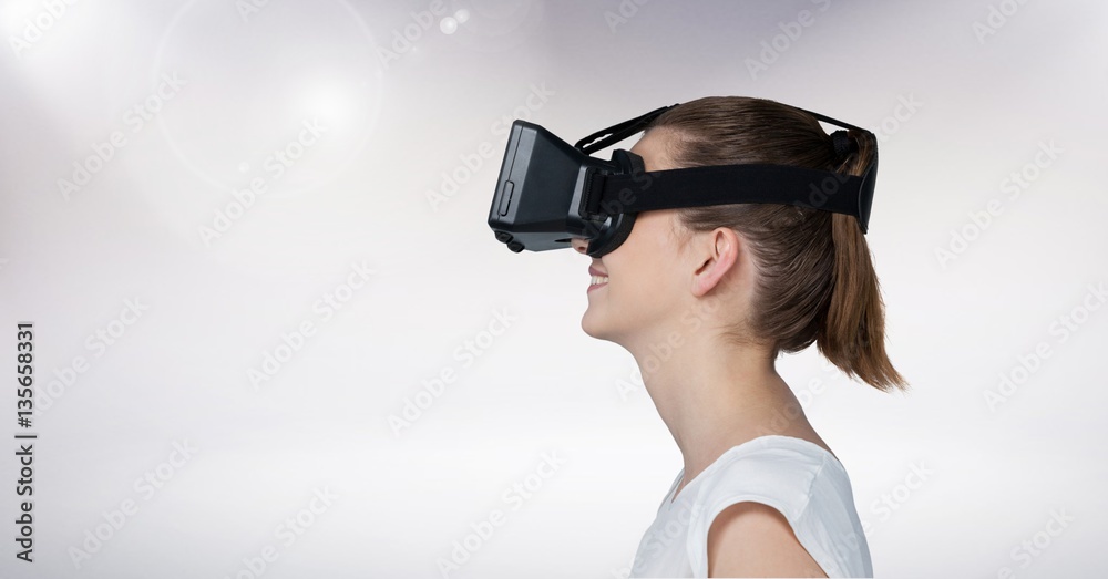 Woman using virtual reality headset Woman using virtual reality headset