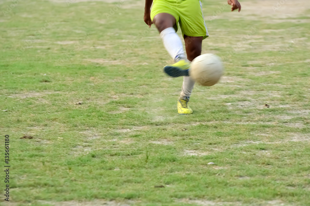 kick soccer ball