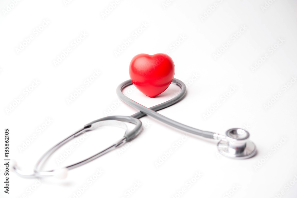 Medical stethoscope and heart isolated on white Medical stethoscope and heart isolated on white