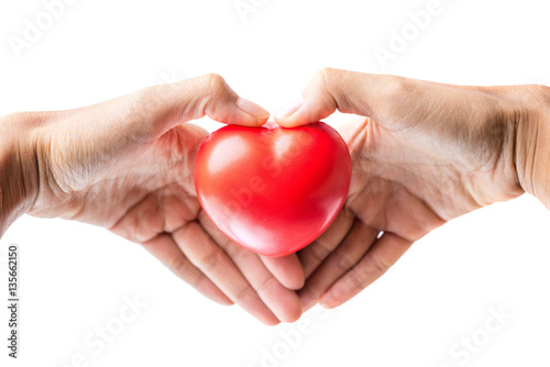 woman hands giving red heart
