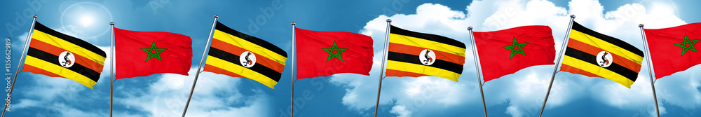 Fototapeta premium Uganda flag with Morocco flag, 3D rendering