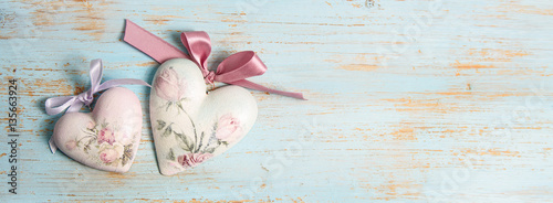valentines day or wedding background with shabby chic heart on old, painted wood and copy space. love concept 