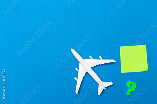 model of passenger plane on blue background © fotofabrika