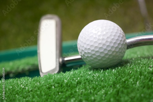 Golf ball and putter