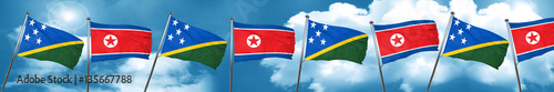 Solomon islands flag with North Korea flag, 3D rendering