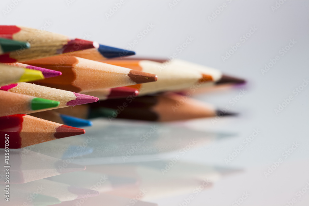 Group of sharp colored pencils with reflexions Group of sharp colored pencils with reflexions