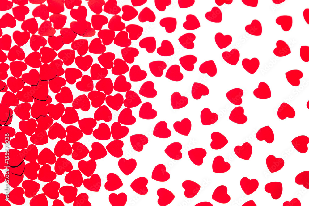 Valentine's day decorative pattern red hearts confetti isolated on white background. Festive valentine backdrop. Valentine's day decorative pattern red hearts confetti isolated on white background. Festive valentine backdrop.