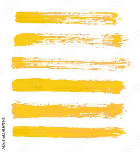 yellow vector strokes of paint on white background