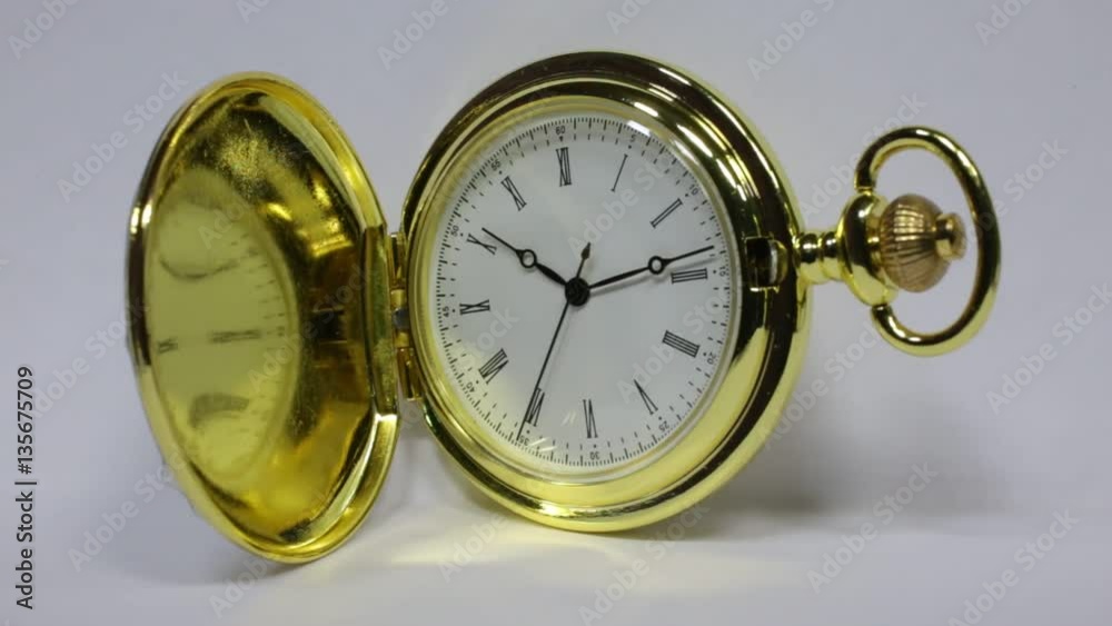 Golden classic watch. In this video, retro pocket watch close-up shot. Roman Dial. In the video, there is blurring. The video has some interesting highlights. Video for business. Golden classic watch. In this video, retro pocket watch close-up shot. Roman Dial. In the video, there is blurring. The video has some interesting highlights. Video for business.