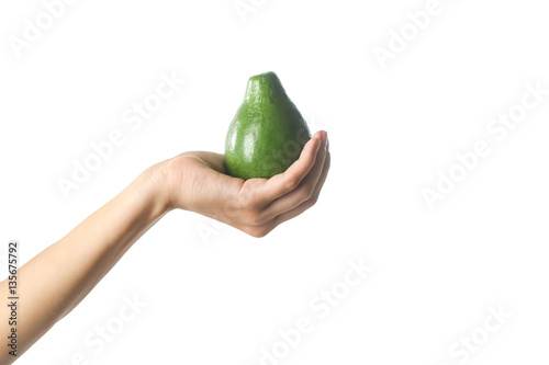 Hand with avocado isolated on white