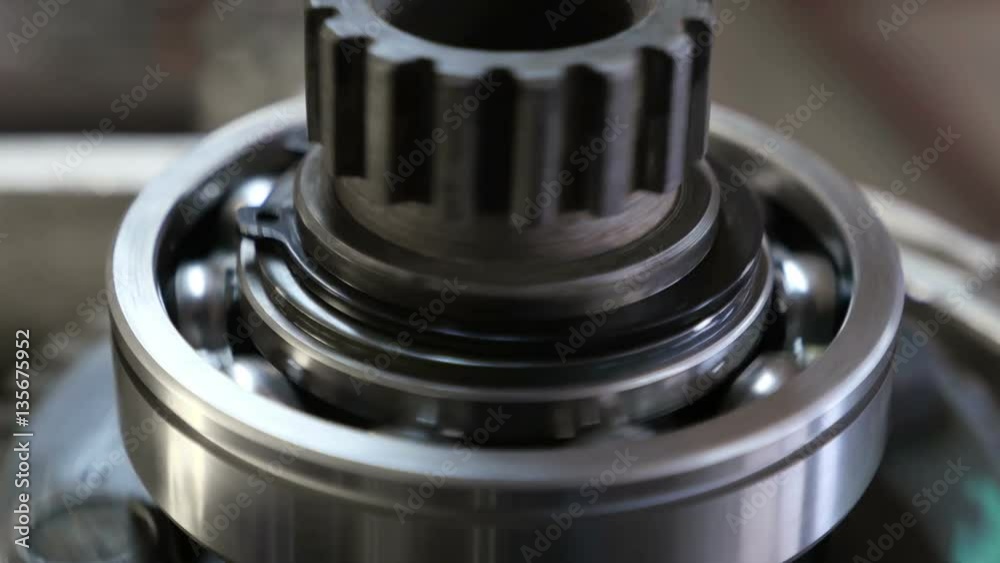 working of mechanism with ball bearing, close-up