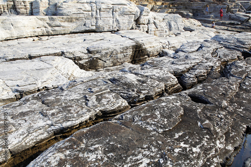Landscape with water and rocks in Thassos island, Greece, next to the natural pool called Giola Beautiful textures and details