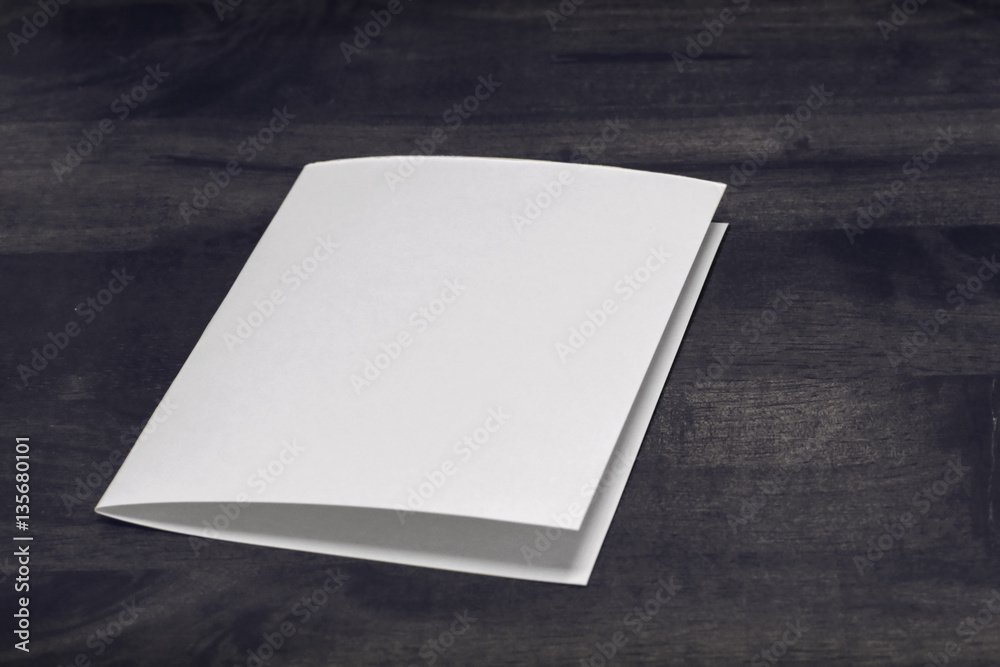 blank papers stack up on wooden table. blank papers stack up on wooden table.