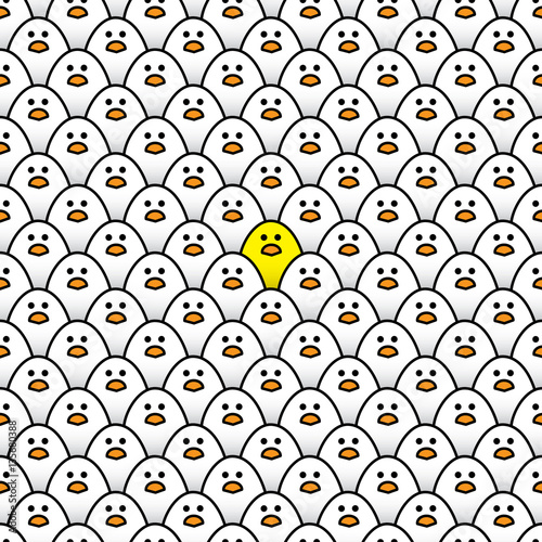 Single Yellow Chick Surrounded by White Chicks