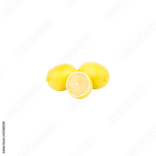 Three ripe yellow lemons, isolated