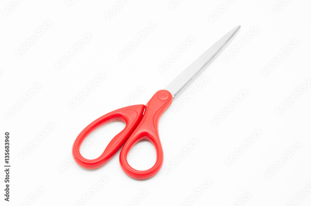 Red scissors on white background Red scissors on white background