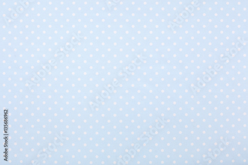 Blue polka dot fabric texture background