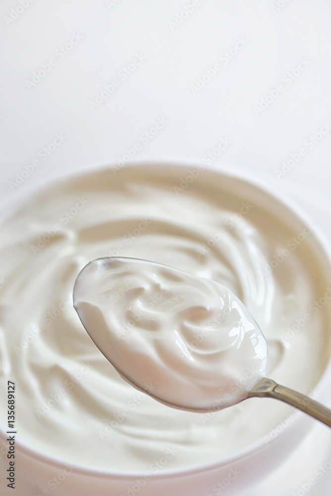 Ceramic bowl of white yogurt Ceramic bowl of white yogurt