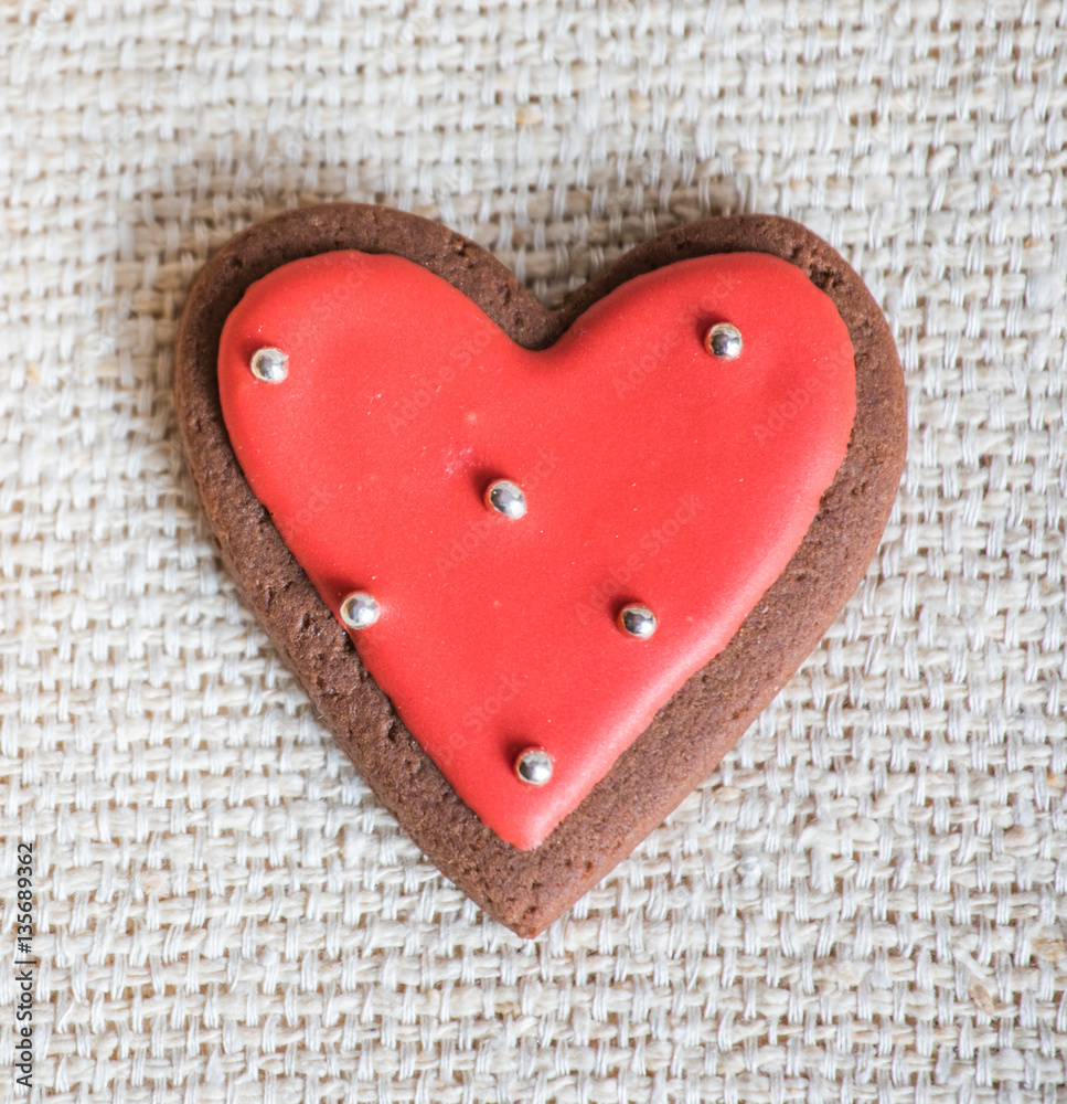 Heart shaped chocolate Valentine's Day cookies with red and white glaze. Heart shaped chocolate Valentine's Day cookies with red and white glaze.