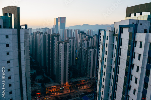 The sunrise view of the skyscrapers filled with sunlight in Xining, Qinghai province in central China.