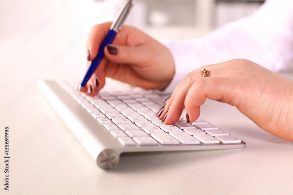 Young businesswoman working on a laptop Young businesswoman working on a laptop