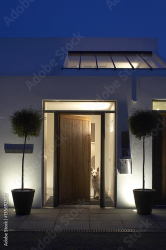 House in Kent, Entrance at dusk, with dog photo