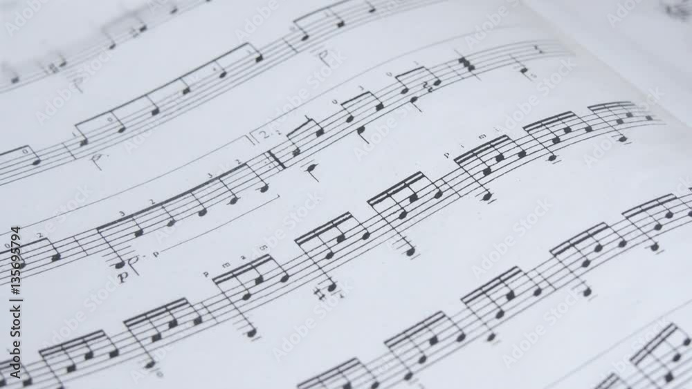 Musical score, or sheet music, showing the five-line staff with some notes and a tablature with its lines and numbers Musical score, or sheet music, showing the five-line staff with some notes and a tablature with its lines and numbers