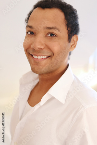 Portrait of handsome interracial man